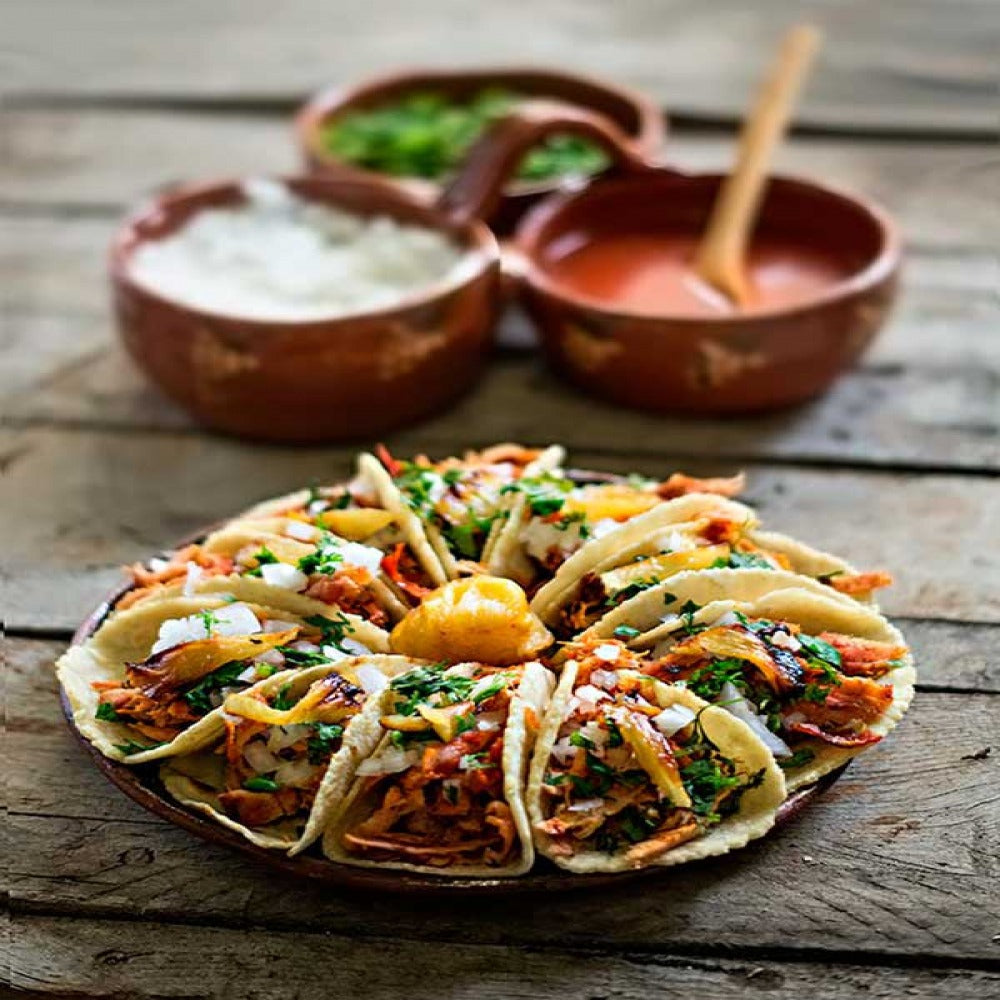 Porción de tacos al pastor